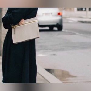 India Hicks Envelope Bag with oversized zipper. No strap. Pebbled leather.